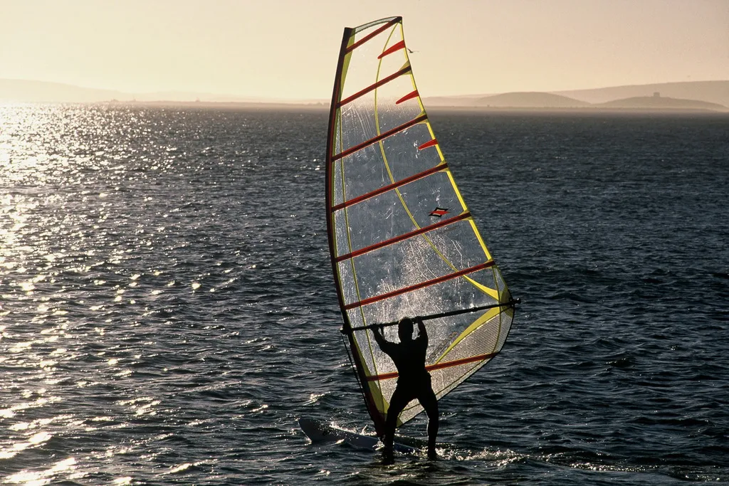 A windsurfer on the water at Langebaan, on South Africa's West Coast